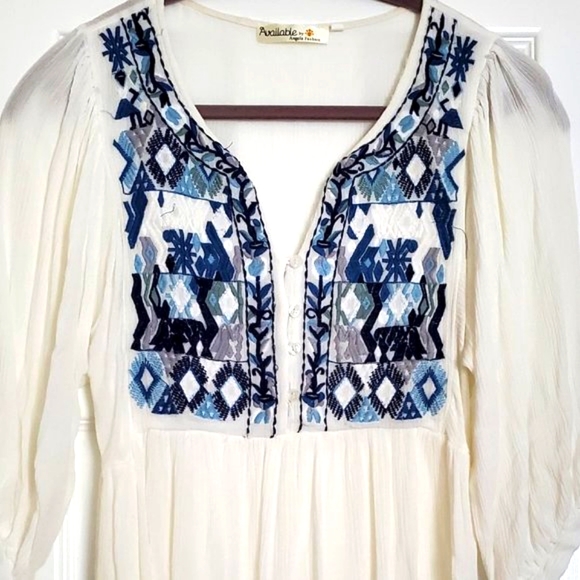 Available Tops - Gorgeous white tunic top with detailed blue embroidered front and button closure